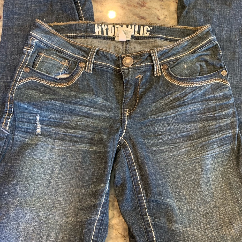 Hydraulic distressed boot cut